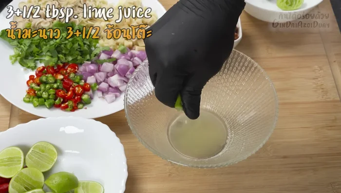 Prepare the herbal dressing: Combine lemon juice, cooled sugar syrup, fish sauce, palm sugar (optional), lemongrass, ginger, shallots, chili, and coriander. Adjust to taste.