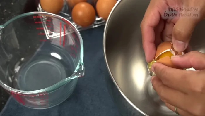 Separate egg yolks and egg whites.
