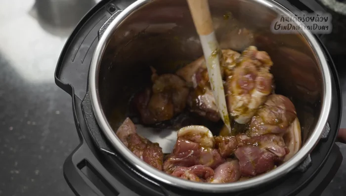 Sear the pork: Add the pork leg pieces to the instant pot and stir-fry until seared on all sides. (743.32)