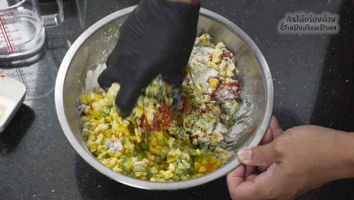 Mix well: Use your hands to thoroughly combine all ingredients until a thick, but not too stiff, consistency is achieved. Add more flour or eggs if needed to adjust the consistency.