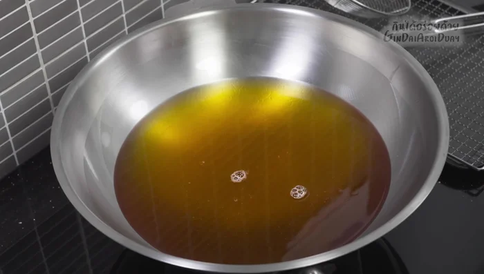 Fry the corn cakes: Scoop spoonfuls of the mixture into the hot oil. Fry until golden brown on both sides, ensuring the inside is cooked through. Adjust heat as needed to prevent burning.