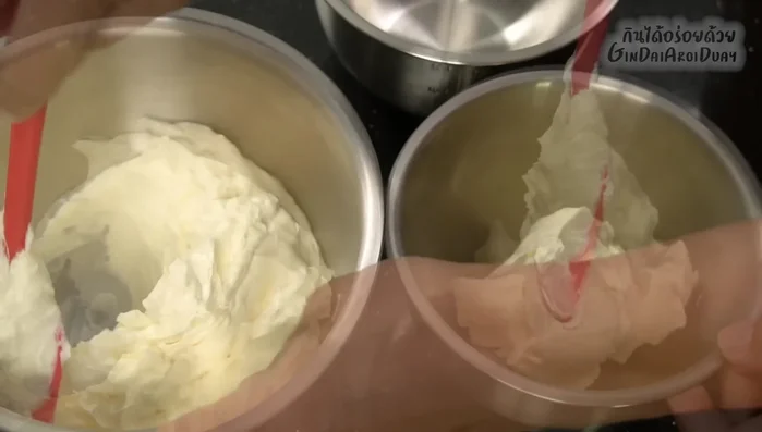 Divide the buttercream into portions and add gel food coloring to achieve desired colors (red, green, white).