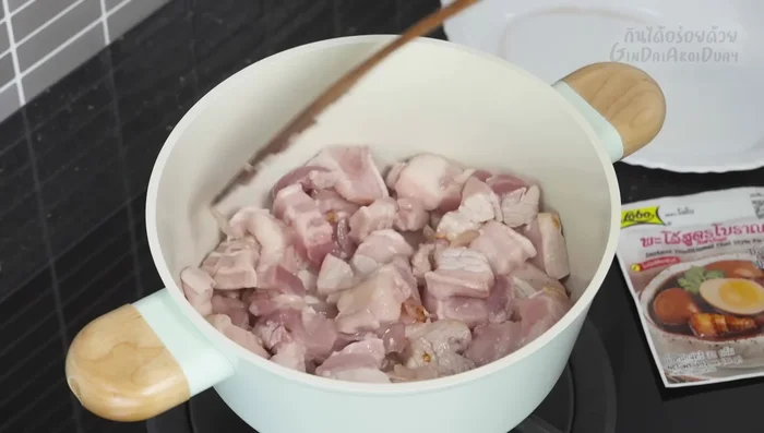 Add the pork belly and stir-fry until firm.