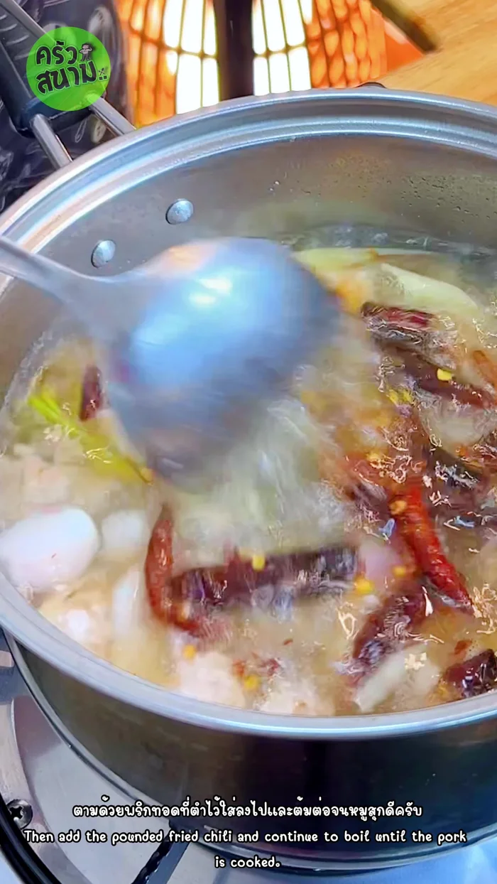 Continue boiling until the pork is cooked through.
