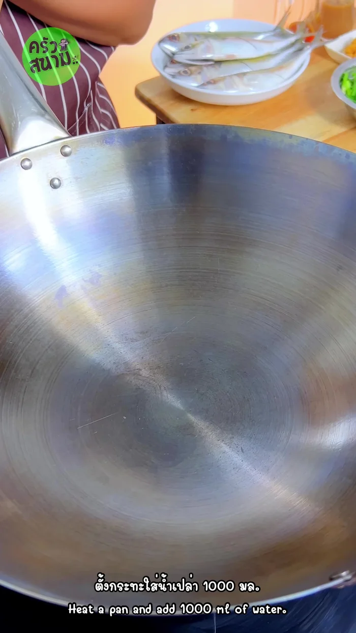 In a pan, add jungle water, curry paste, and water used to rinse the mortar. Boil.