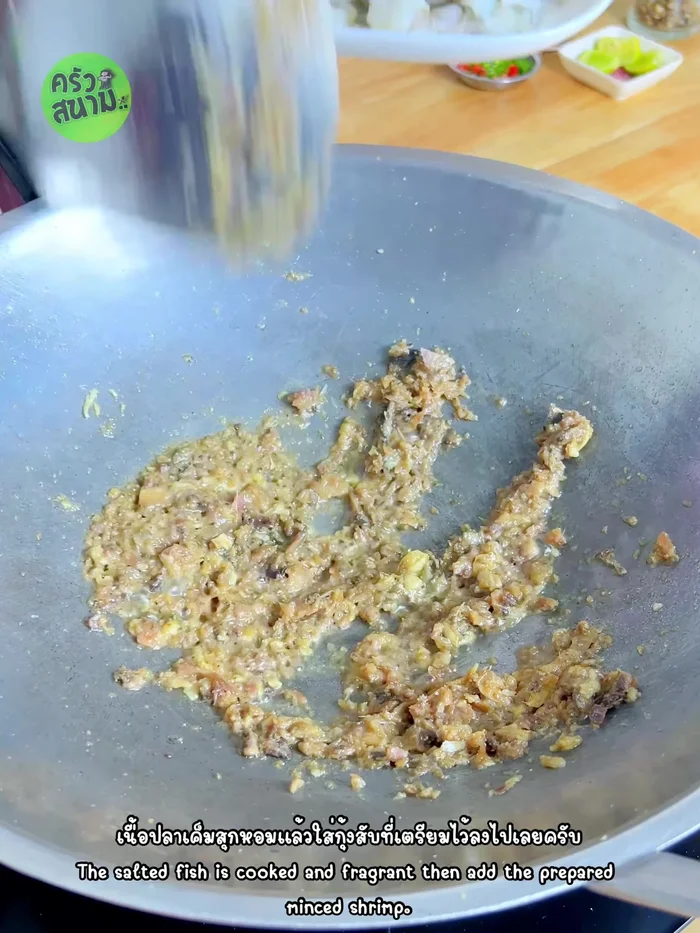 Add the minced shrimp and stir-fry until cooked through. You can substitute with minced pork or chicken if preferred.