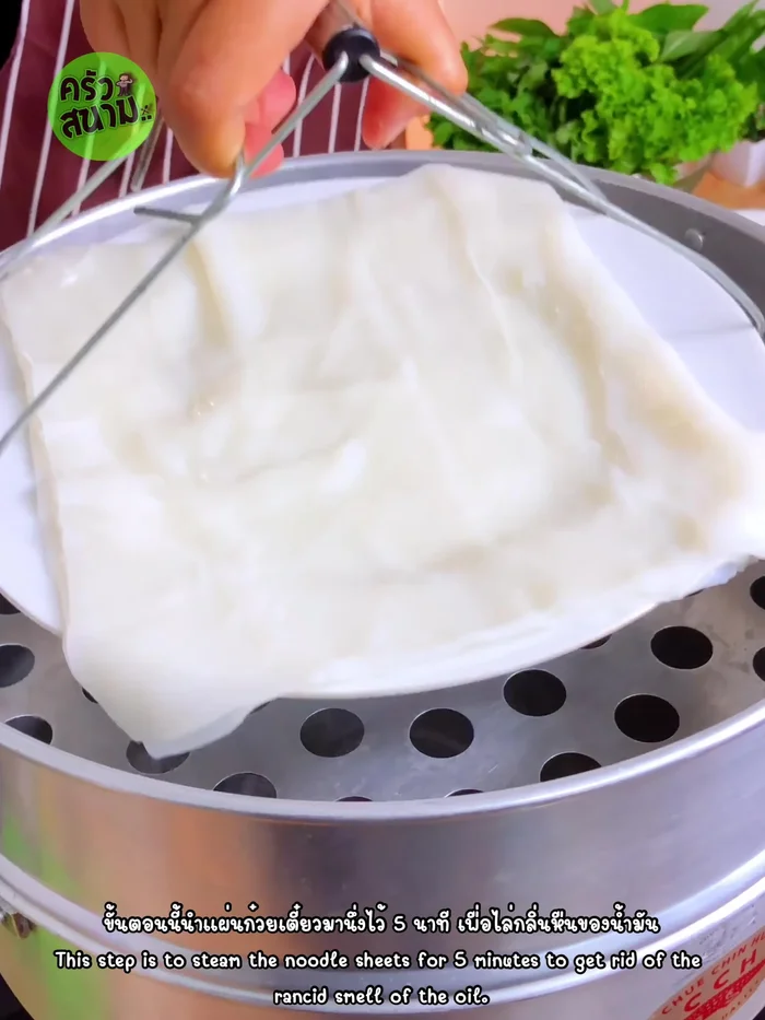 Steam noodle sheets for 5 minutes to remove oil smell. Let rest.