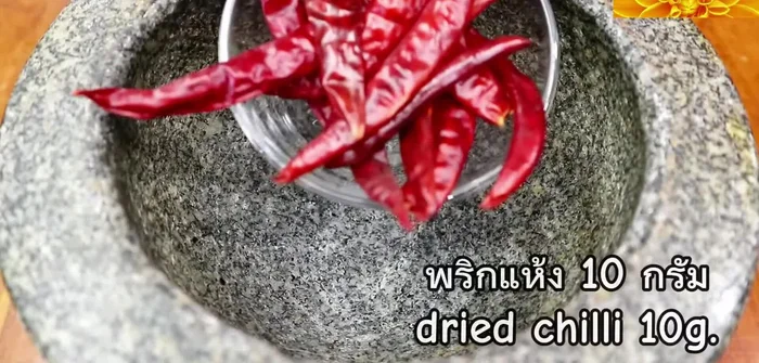 Prepare the ingredients: Clean and prepare the Nile Tilapia. Finely chop garlic, ginger, chili, lemongrass, shallots, and Thai basil.