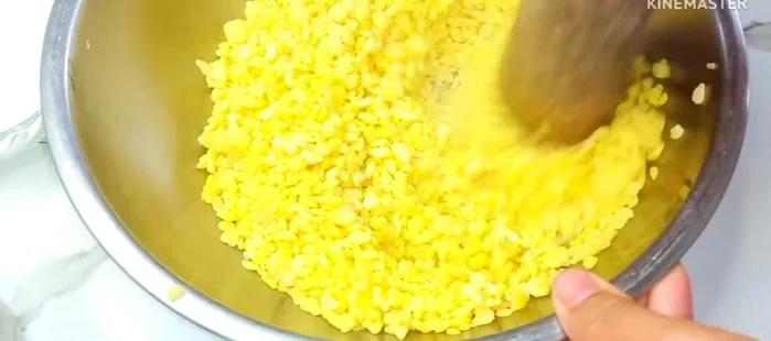 Once cooked, grind the beans finely using a stone pestle or blender.