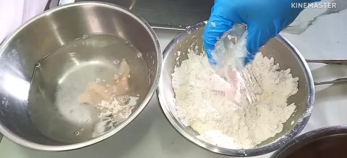 Dip in water: Dip the flour-coated chicken in water, then shake off excess water. Repeat the flour coating process once more.