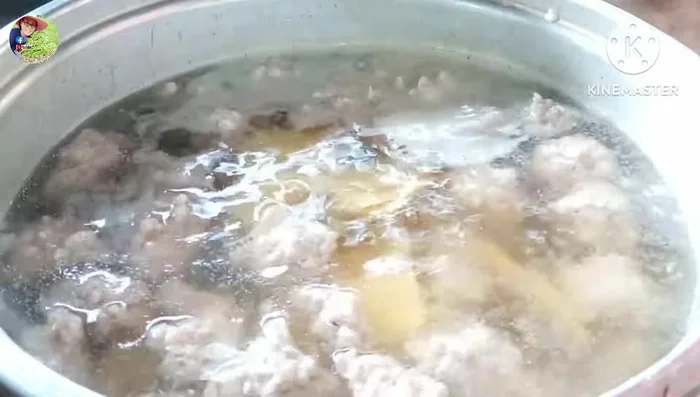 Add soaked dried shiitake mushrooms and boiled bamboo shoots. If using, add Chinese flower and/or tofu foam.