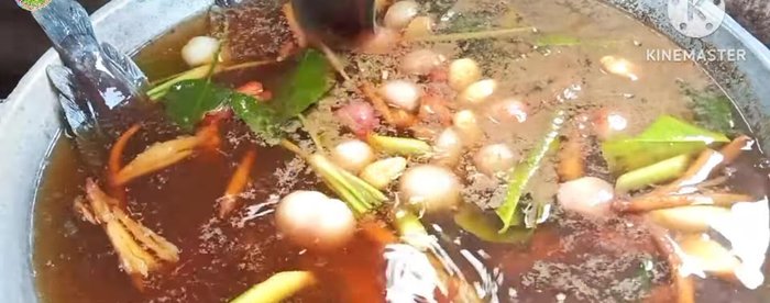 Add the catfish to the boiling broth.