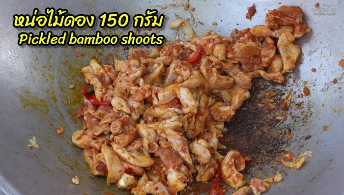 Add the boiled bamboo shoots and stir-fry over high heat.