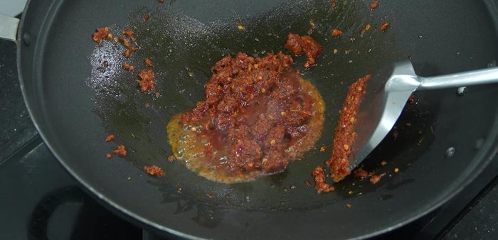 Add fish sauce and palm sugar. Stir-fry until the palm sugar melts.