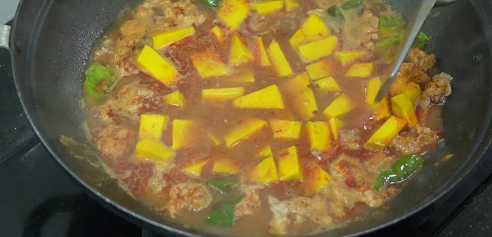 Add pumpkin and cook until tender (easily pressed down with a spoon).