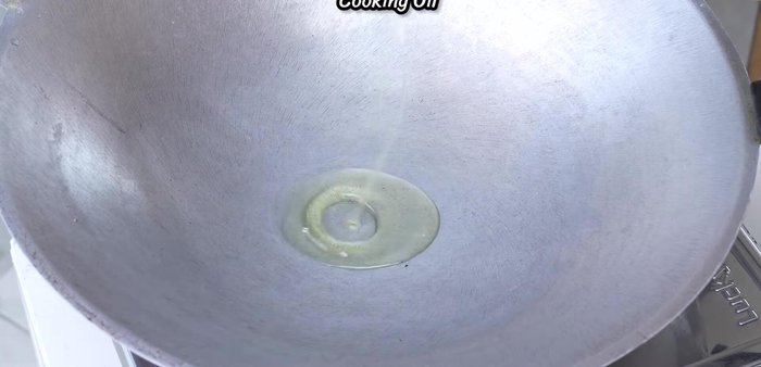 Heat up a pan and add oil. Wait until it's hot enough.