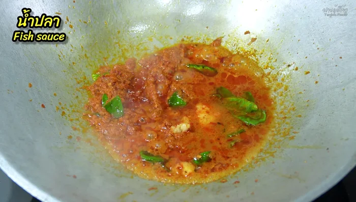 Add palm sugar, fish sauce, and seasoning powder. Stir until the palm sugar melts.