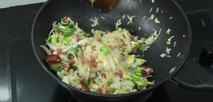 Garnish with spring onions and coriander.