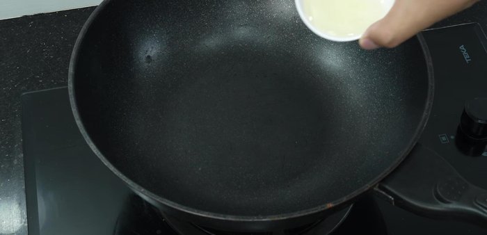 Heat a pan and add oil. Wait until the oil is hot, but not too hot.