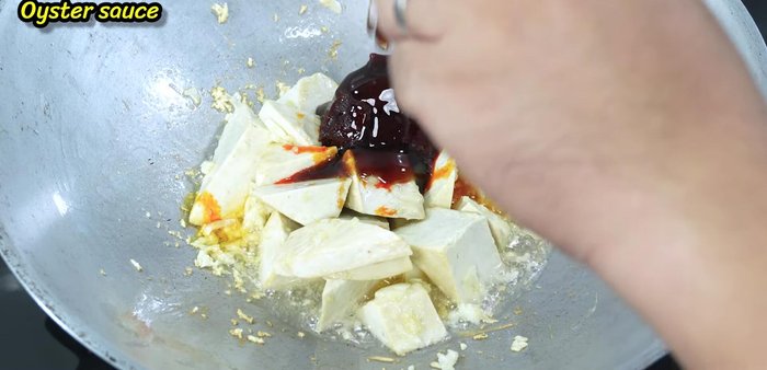 Add chili paste, oyster sauce, soy sauce, and sugar. Stir to combine and dissolve the sugar and chili paste.