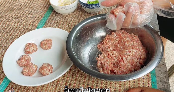 Shape the marinated pork into balls.