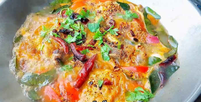 Garnish with coriander and parsley.
