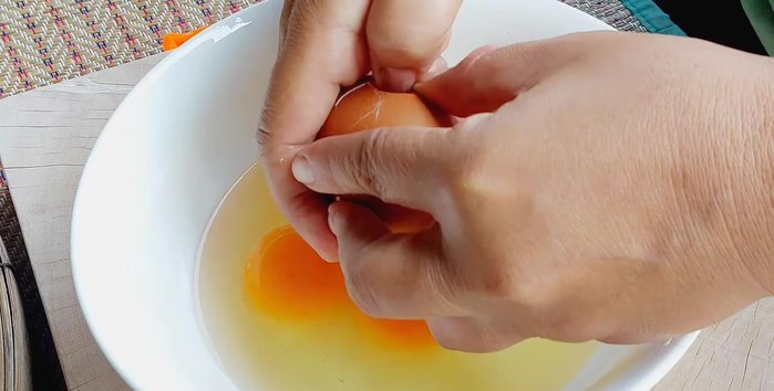 Crack eggs into a bowl and beat until smooth.