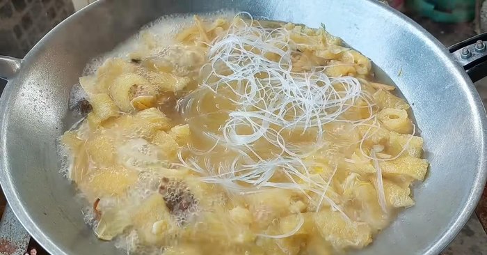 Add the soaked glass noodles. Do not overfill to avoid drying up the water.