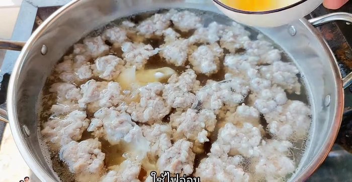 Poach the eggs: Crack each egg into a separate cup (170.159). Gently pour the eggs into the simmering soup, one at a time, using a low heat to prevent them from breaking (174.08). Cook for 2-3 minutes for runny yolks or 3 minutes for firmer yolks (201.4).