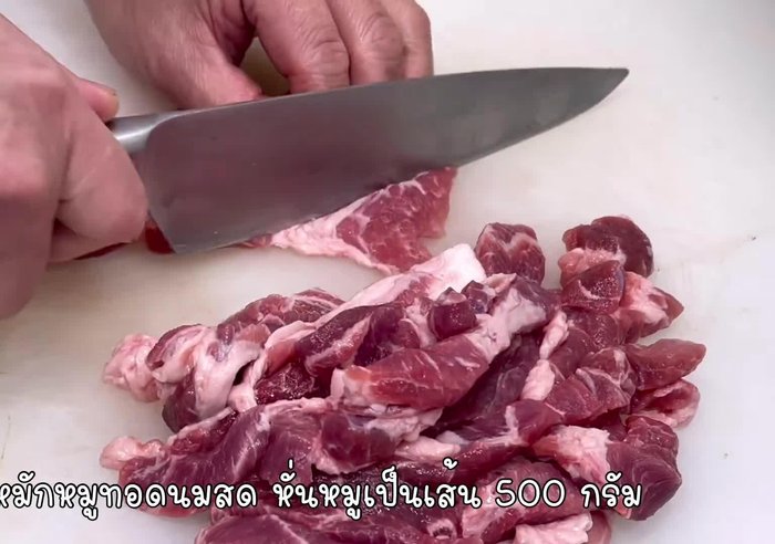 Prepare the Nam Prik Pla Krapong (spicy fish paste). (Details are not available in the transcript)