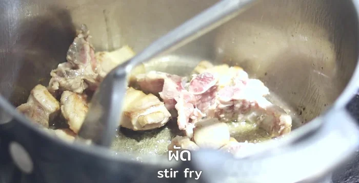Adjusting seasonings or ingredients during steaming (likely)