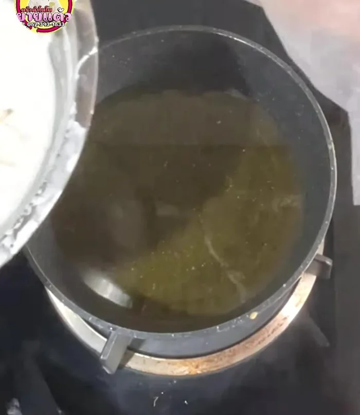 Add the prepared ingredient to the hot oil, ensuring they are not overcrowded. Fry until golden brown and crispy.