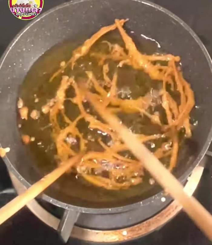 Check for crispiness by observing air bubbles; fewer bubbles indicate crispier food. All the water should have evaporated.