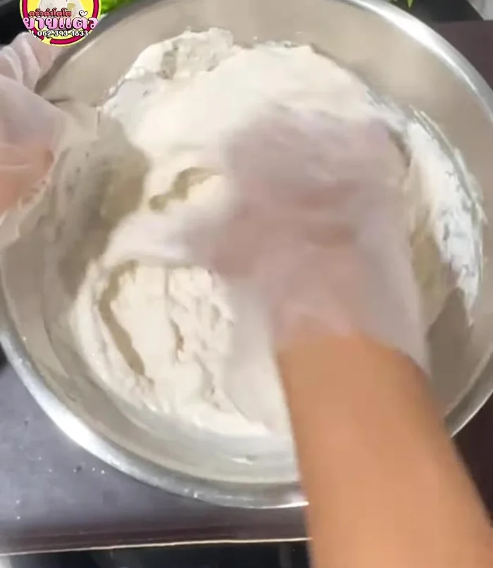 Mix the flour using your hands until a dough forms.