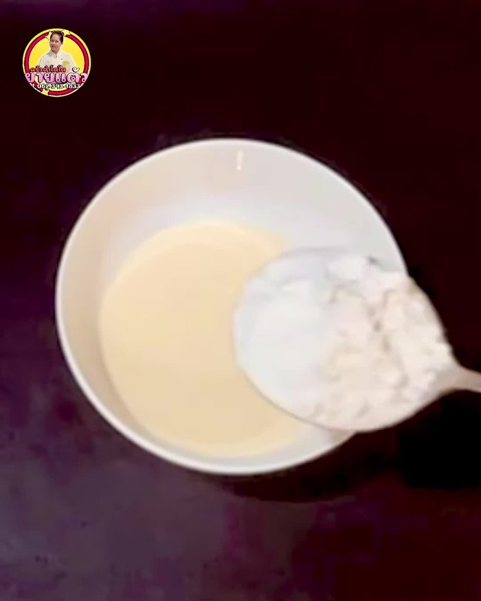 Mix eggs, Carnation milk, bread flour, salt, sugar, and yogurt in a wide pan until the flour and sugar dissolve. Add baking powder.