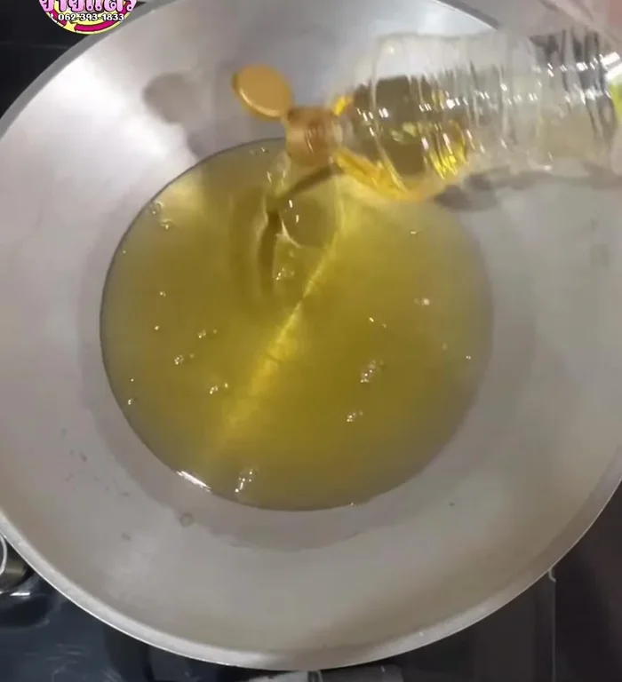 Heat oil in a pan over medium heat. Carefully add the dough balls, stirring gently to separate them.
