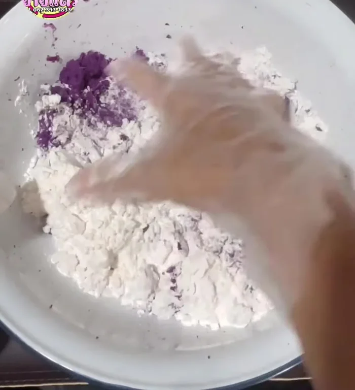 In a bowl, combine half of the tapioca flour with the mashed purple yam.