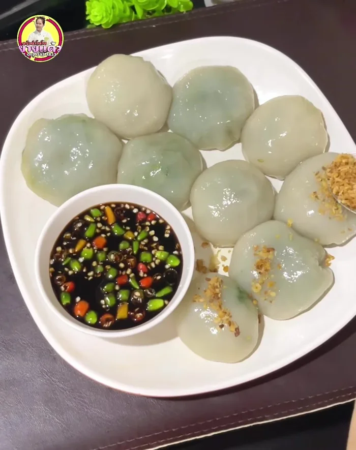 Serve with the cooled dipping sauce, adding fresh chili and/or more fried garlic as desired.