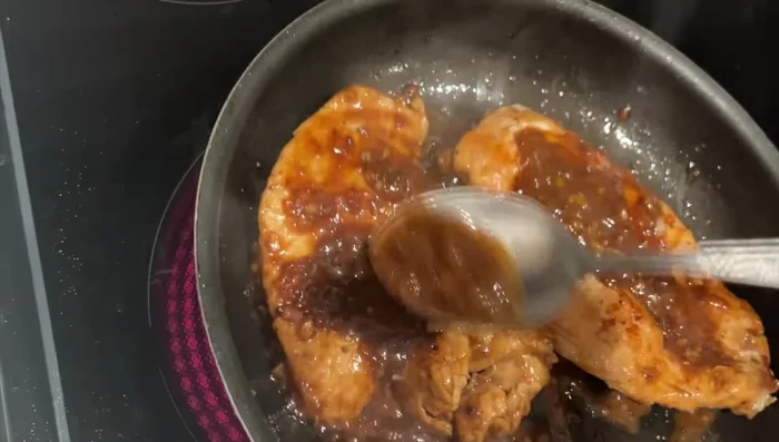 Tilt the pan to collect the remaining sauce and prevent burning.