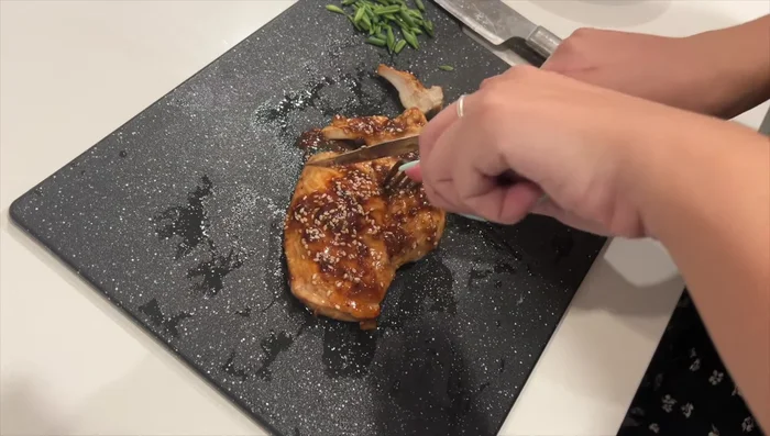 Slice the cooked chicken into bite-sized pieces.