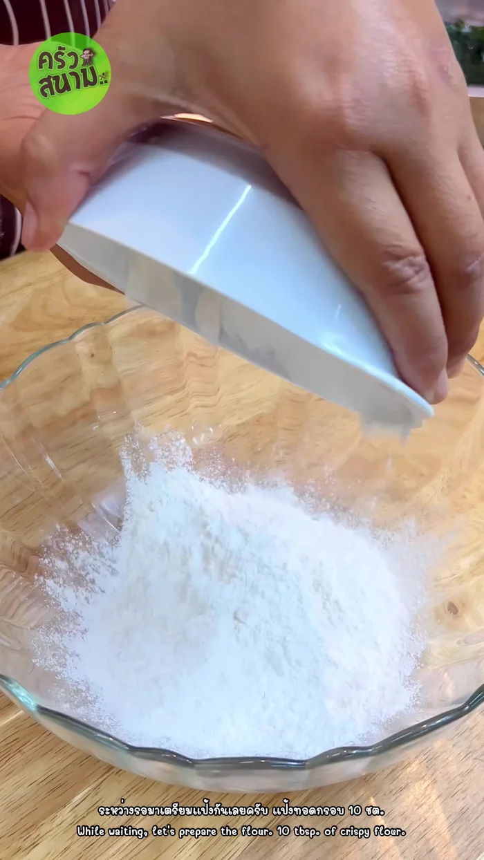 Prepare the batter: Mix flour and cold water gradually until a smooth batter forms. Add a little cow's milk.