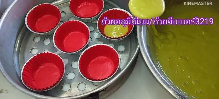 Fill aluminum cups about ¾ full with batter. Place cups in a steamer with pleated cups underneath.