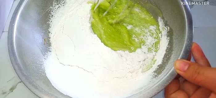 Gently whisk the flour into the wet ingredients until just combined. Let the batter rest for 10 minutes.