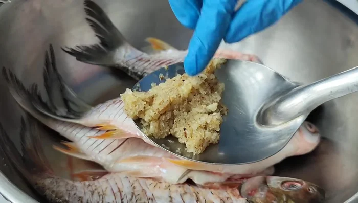 Pound garlic and pepper thoroughly.