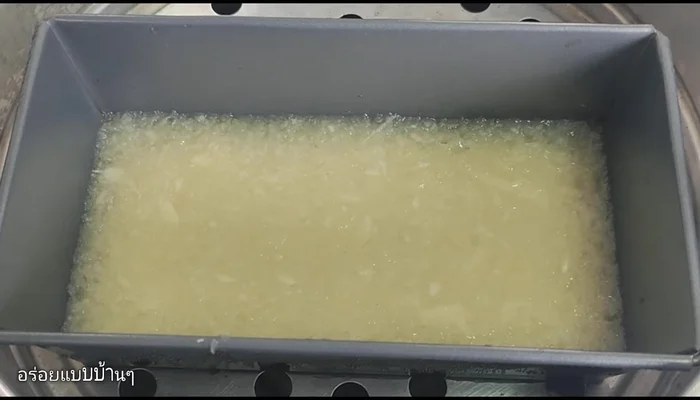 Cool and cut. Allow the cassava cake to cool completely. Cut into squares using a knife or a paddle.