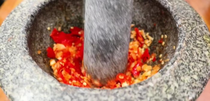 Heat oil in a wok or large frying pan over medium-high heat.