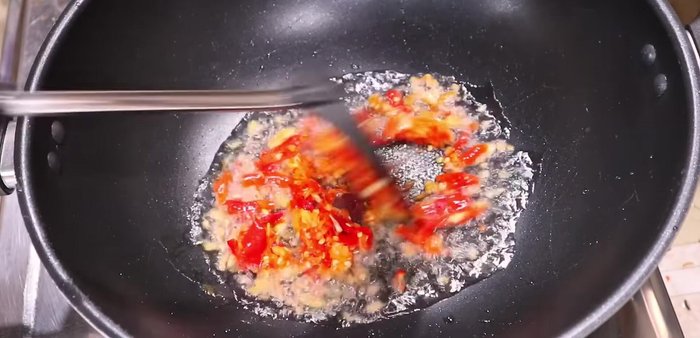 Add the chicken and stir-fry until browned.