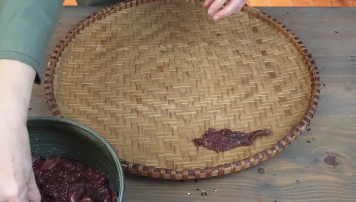 Dry the beef: Traditionally, sun-dry on a bamboo tray for 2 hours. Alternatively, dry in an oven at 120°F for 3 hours, flipping halfway through, or use an air fryer with a dehydration function.