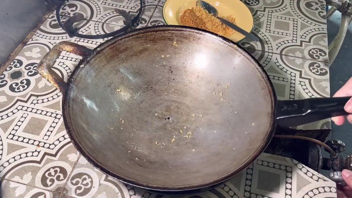 Place the pan on the stove over low heat. Add oil (soybean or canola oil).