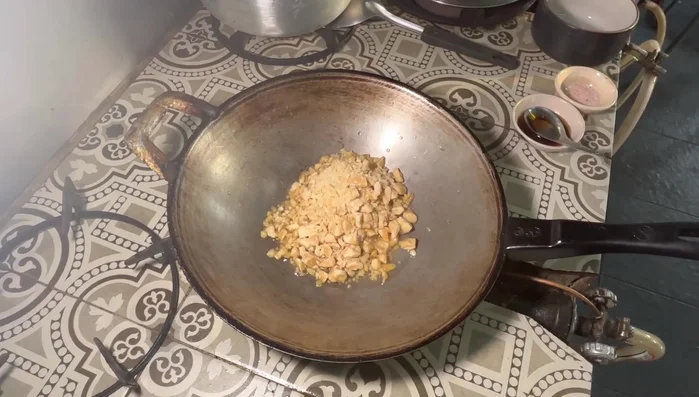 Stir until the sugar dissolves. If using a hard block of sugar, crush it slightly to help it melt.
